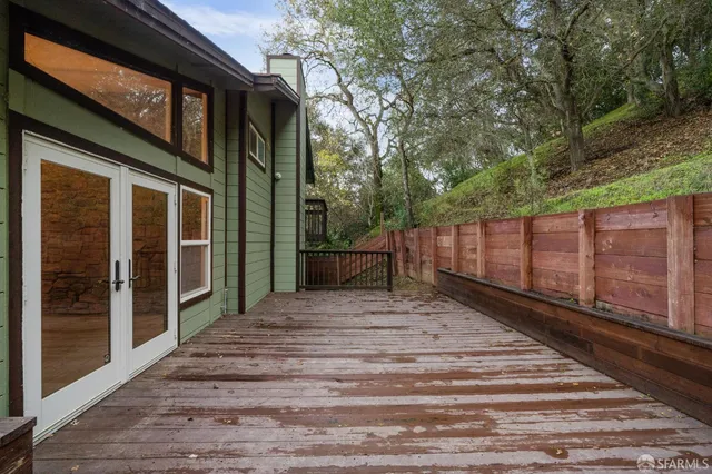 a balcony with an outdoor space