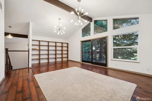 a view of staircase with wooden floor and staircase