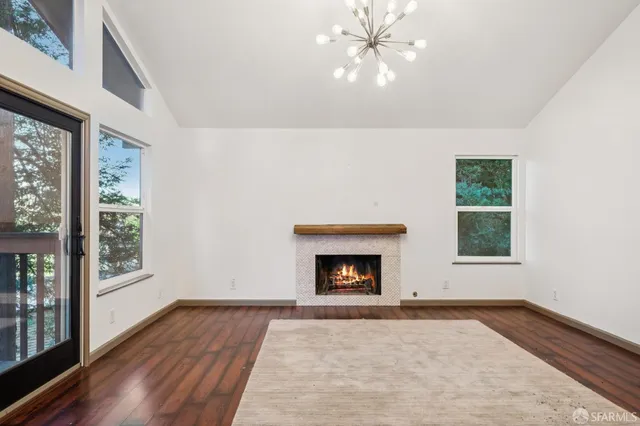 a bathroom with a sink mirror and toilet