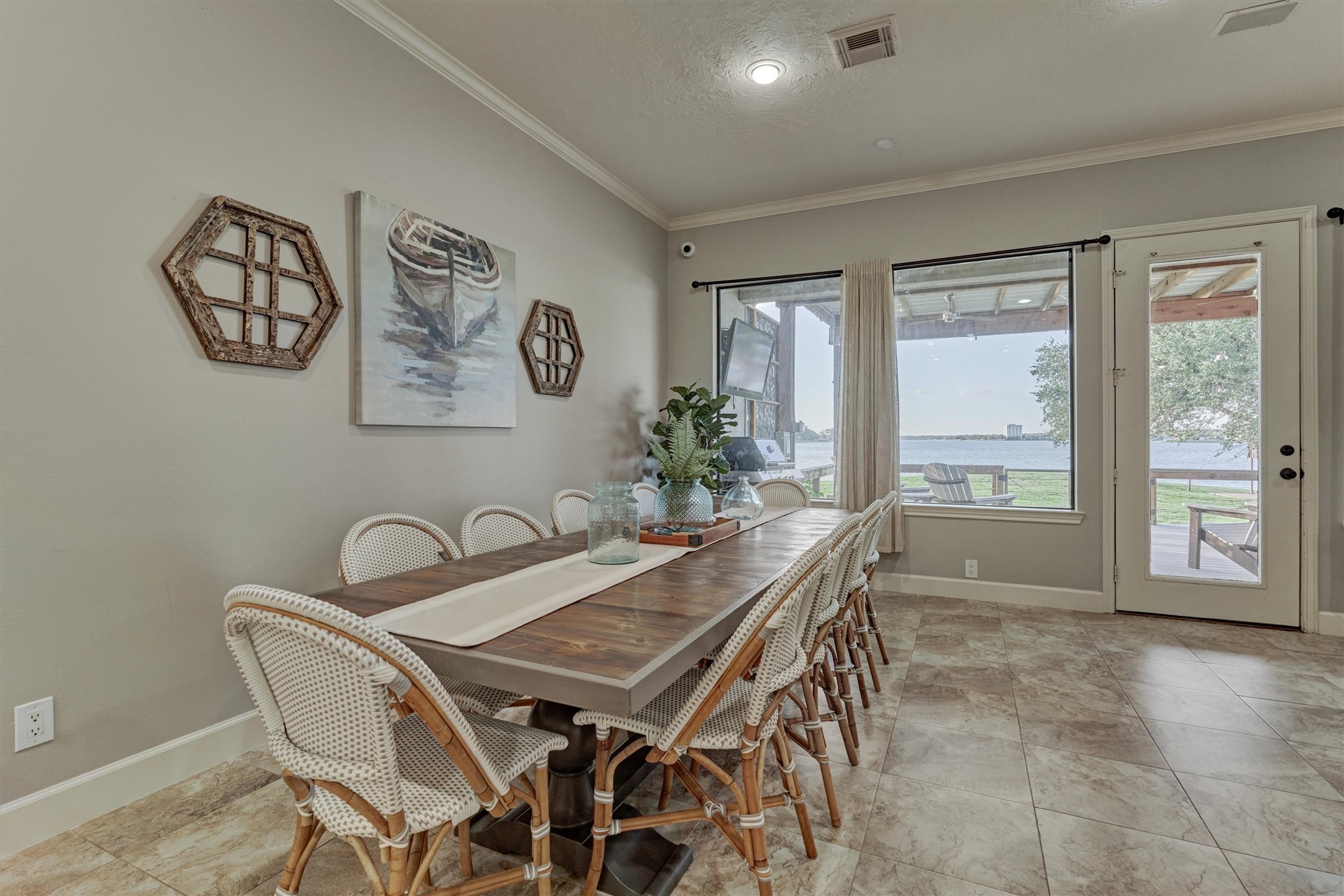 157 Capetown Way Conroe, TX 77356 - Photo 11 of 32 a dining room with furniture and window