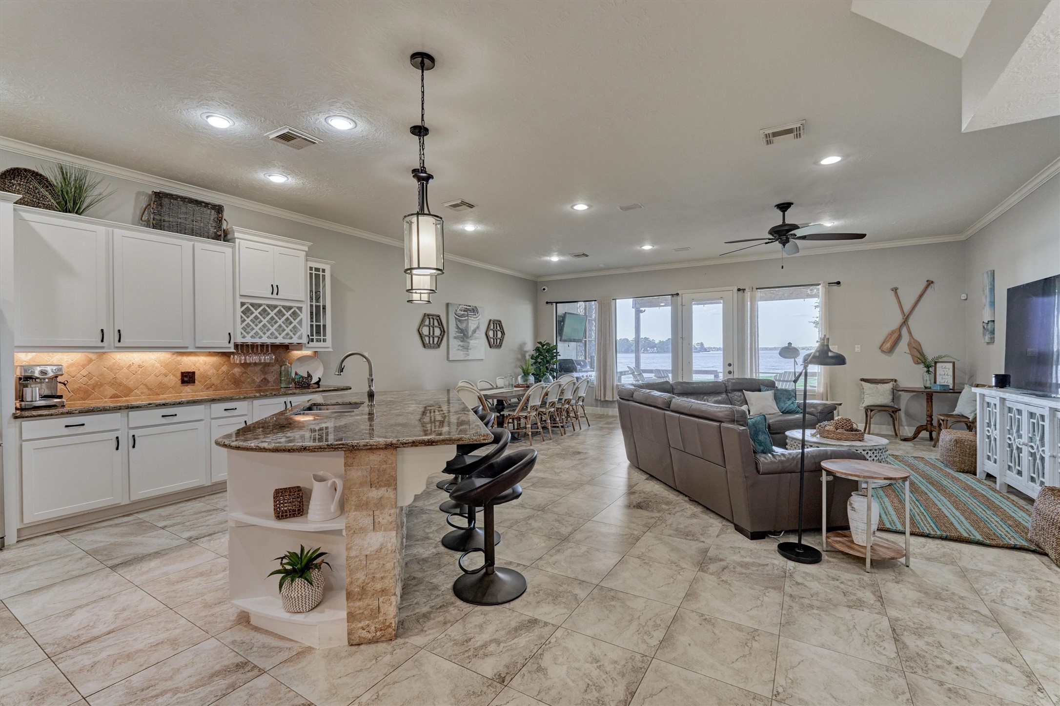 157 Capetown Way Conroe, TX 77356 - Photo 2 of 32 a kitchen with counter space appliances and a view of living room