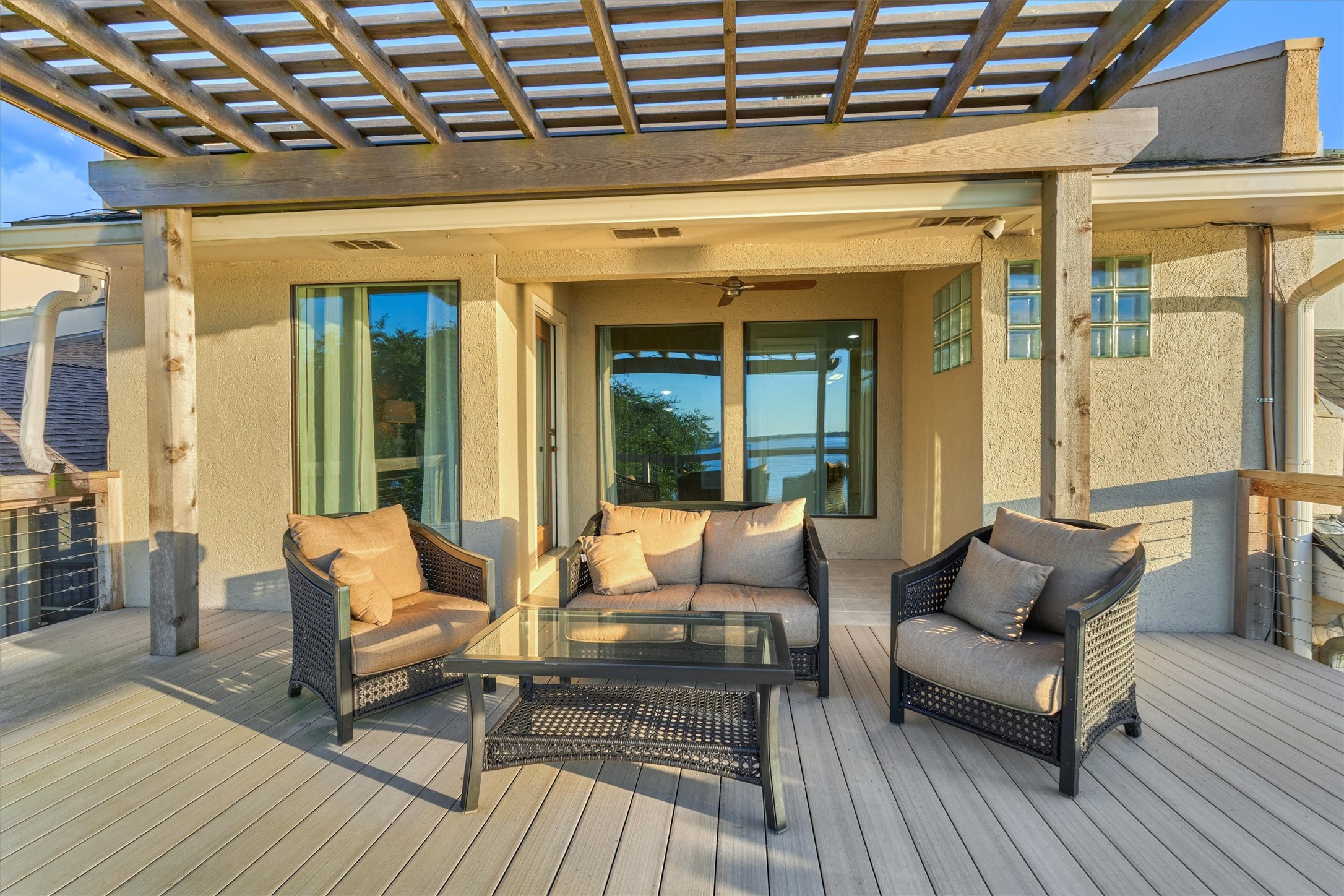 157 Capetown Way Conroe, TX 77356 - Photo 27 of 32 a balcony with furniture and wooden floor