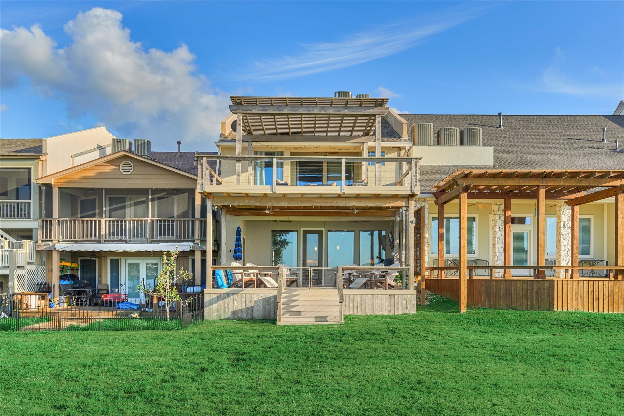 157 Capetown Way Conroe, TX 77356 - Photo 29 of 32 a view of a building with a yard