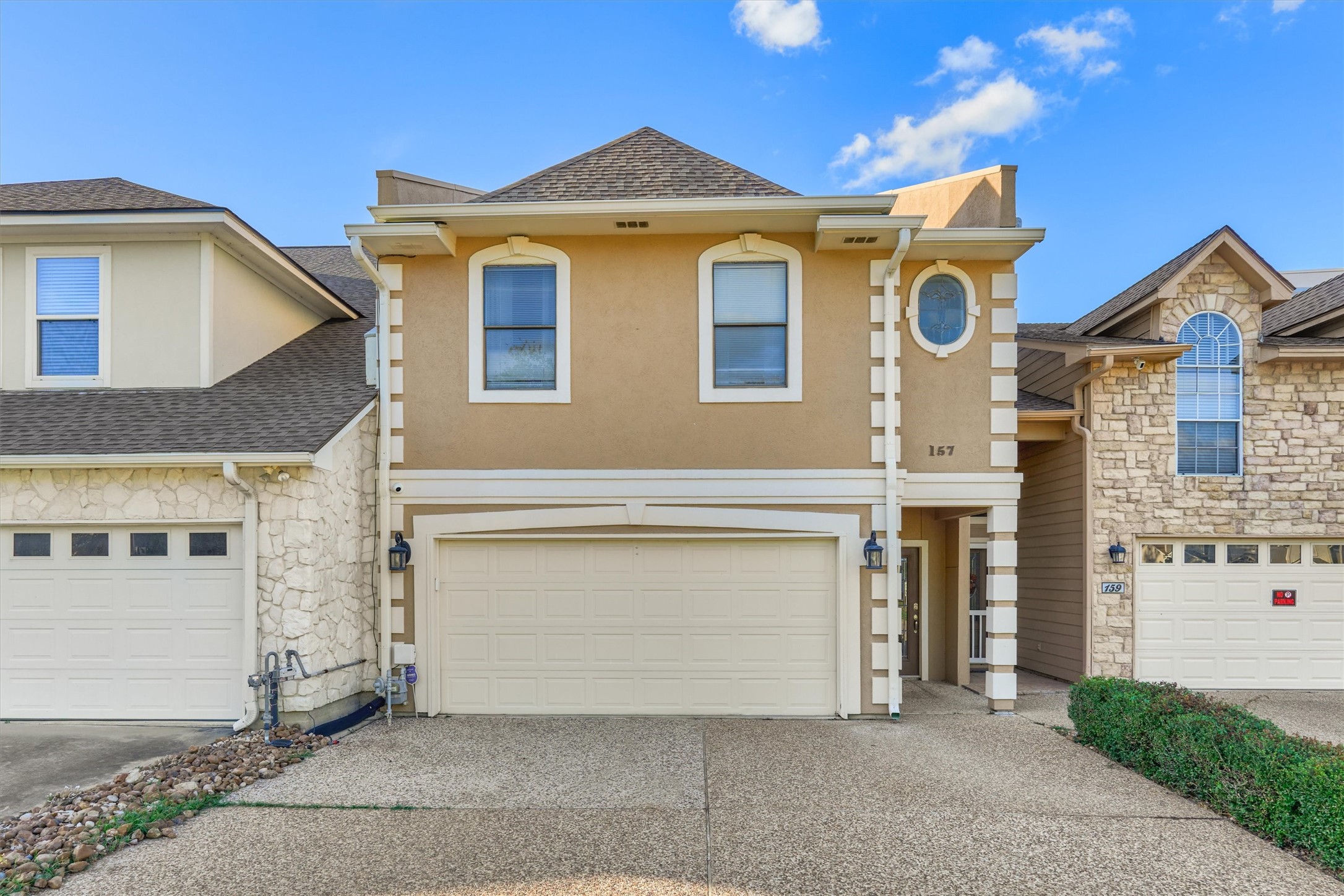 157 Capetown Way Conroe, TX 77356 - Photo 5 of 32 a front view of a house with a garage
