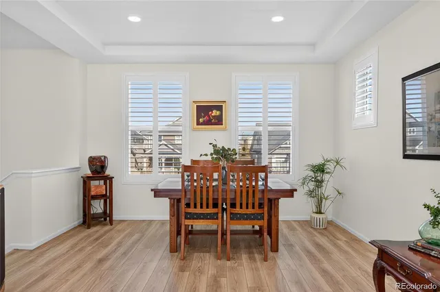 a view of a livingroom with furniture and a window
