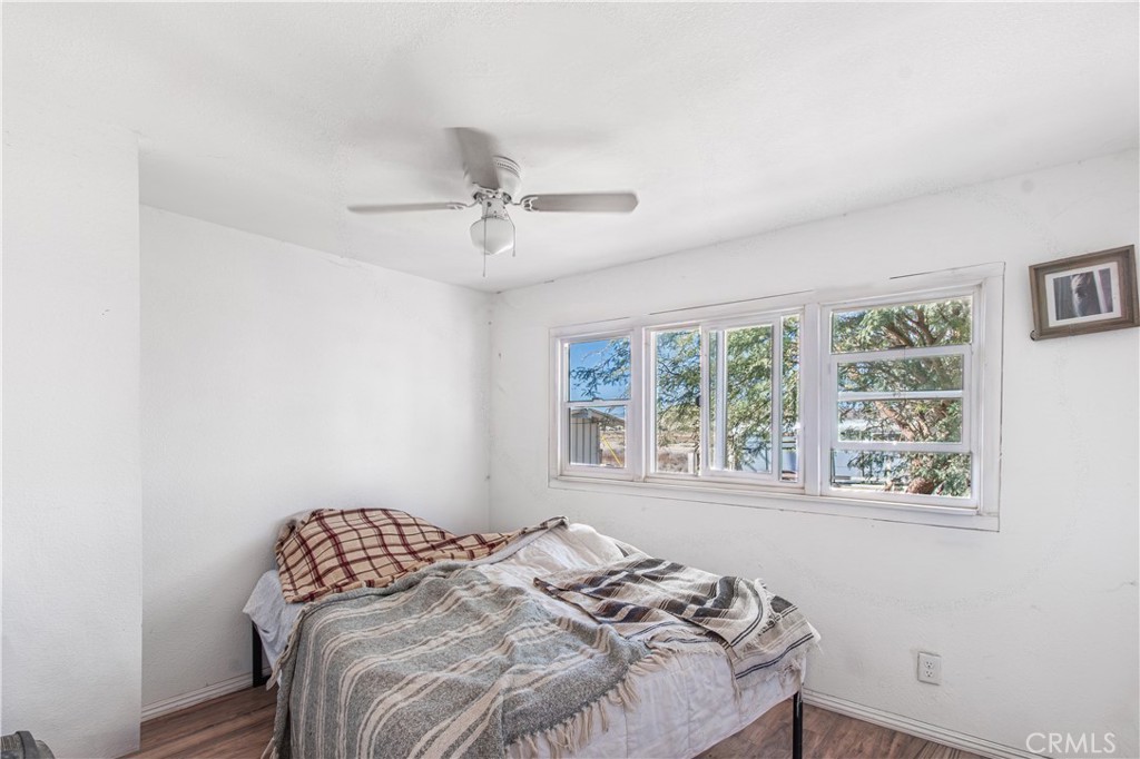 13470 De Sabla Road Santa Margarita, CA 93453 - Photo 9 of 16 a bedroom with a bed and a window