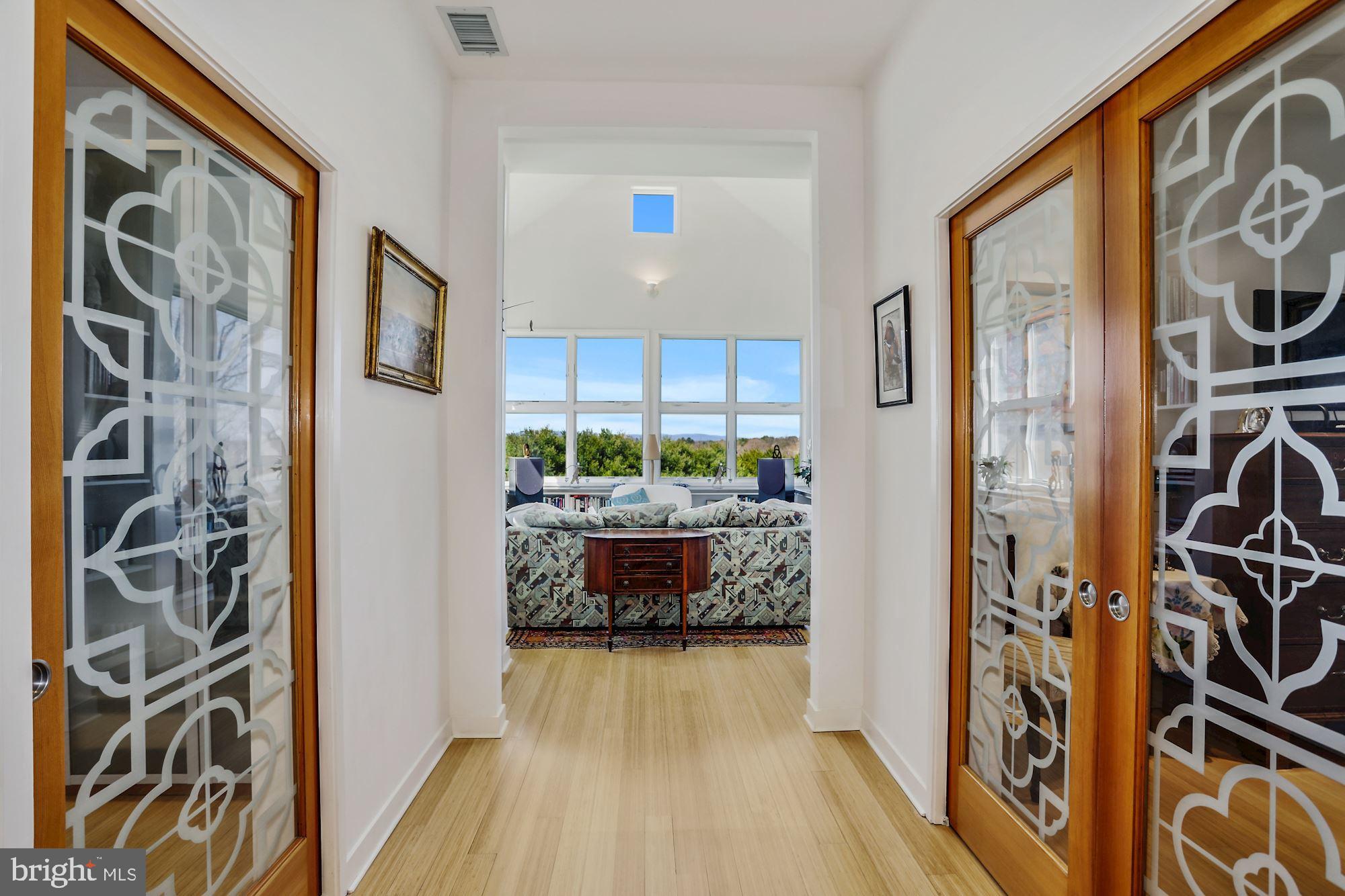 38950 Piggott Bottom Road Hamilton, VA 20158 - Photo 29 of 50 Dramatic Hallway Leads to Conservatory