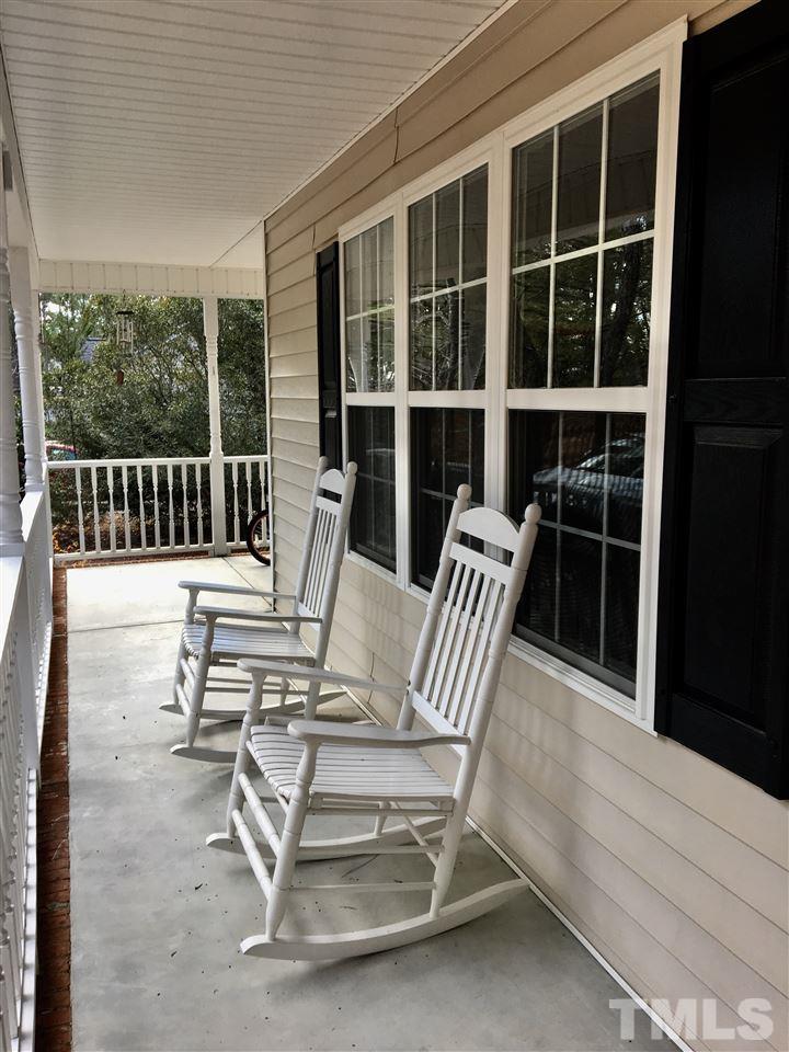 169 South Ridge Drive Garner, NC 27529 - Photo 2 of 20 a view of a chairs and a table in the back yard