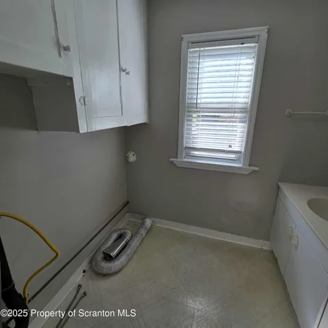 a room with dryer and washer