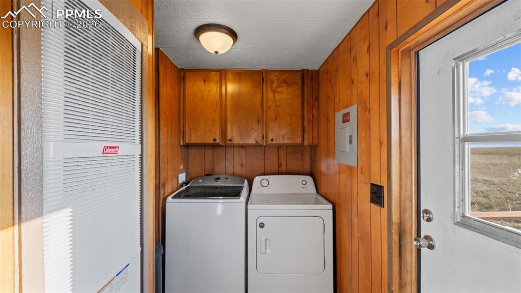 37155 East Jones Road Yoder, CO 80864 - Photo 38 of 50 a view of storage and utility room with washer and dryer
