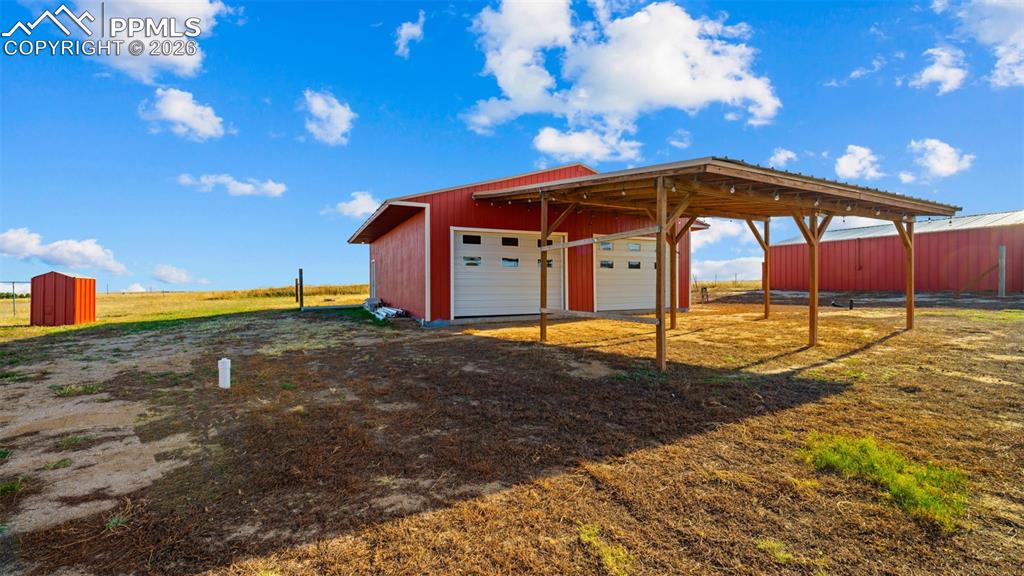 37155 East Jones Road Yoder, CO 80864 - Photo 39 of 50 a front view of a house with a yard