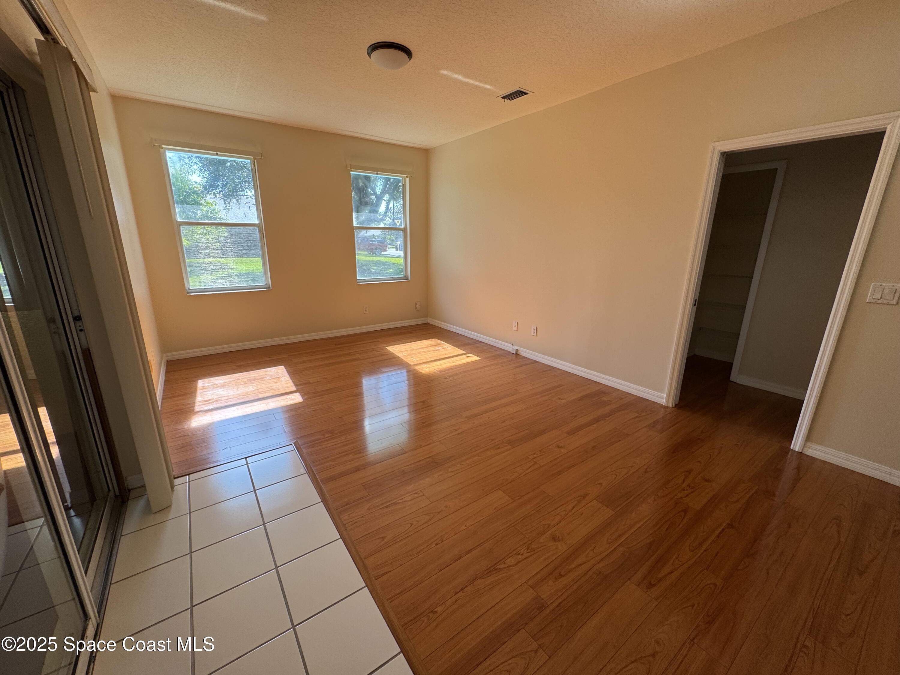 1522 Breese Street Northeast Palm Bay, FL 32905 - Photo 6 of 12 a view of an empty room and window