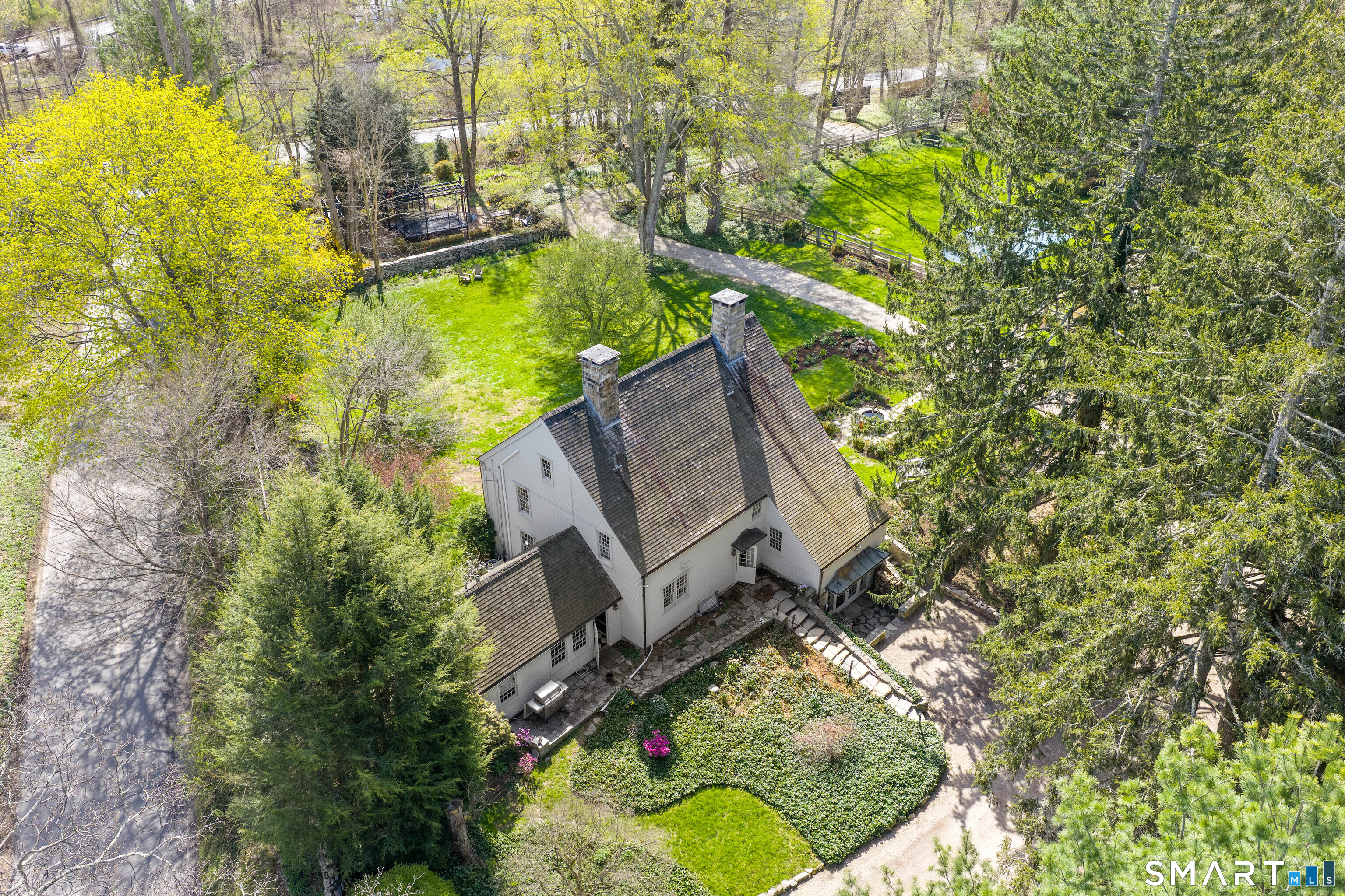 313 Umpawaug Road Redding, CT 06896 - Photo 36 of 40 view of a house with a yard
