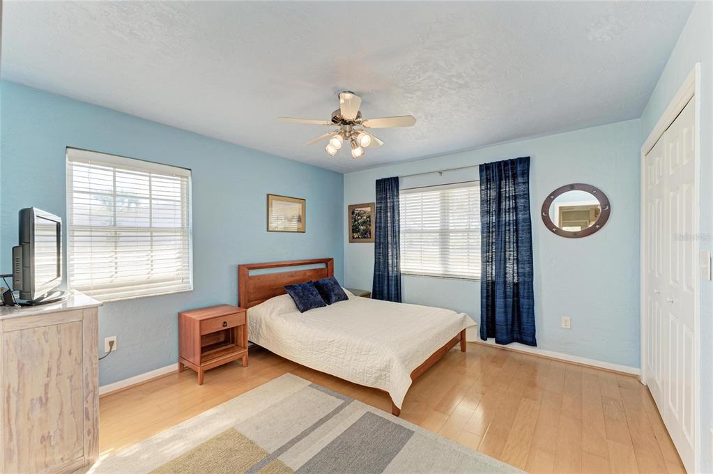 612 Bayshore Road Nokomis, FL 34275 - Photo 25 of 96 a bedroom with a bed and a window