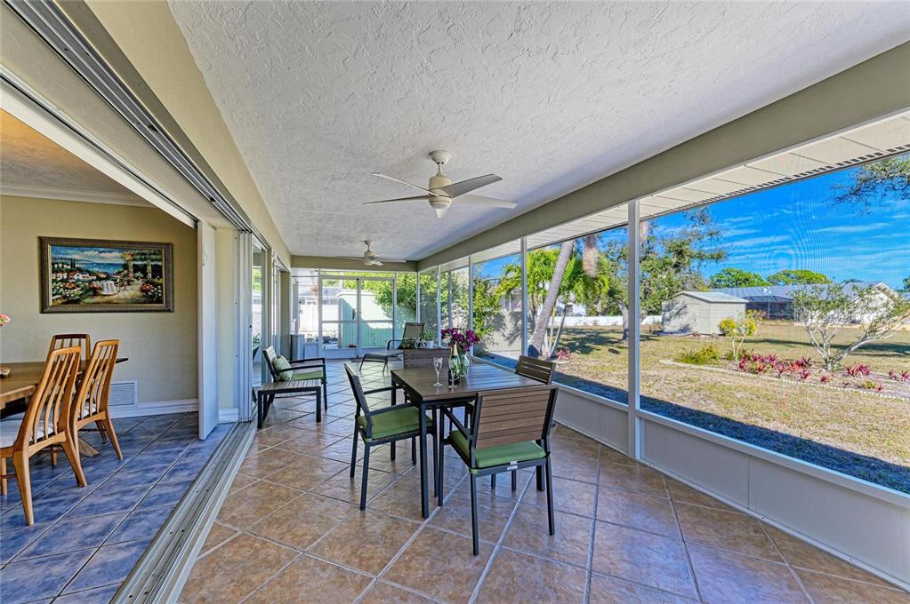 612 Bayshore Road Nokomis, FL 34275 - Photo 37 of 96 a view of a dining room with furniture window and outside view