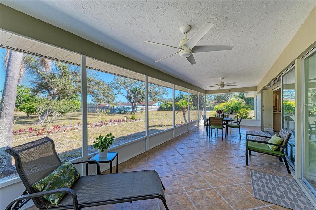 612 Bayshore Road Nokomis, FL 34275 - Photo 39 of 96 a living room with furniture and a large window