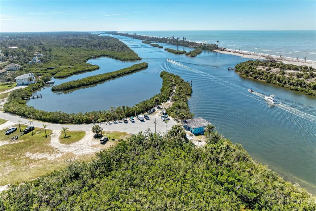 612 Bayshore Road Nokomis, FL 34275 - Photo 90 of 96 an aerial view of a house with a yard and lake view