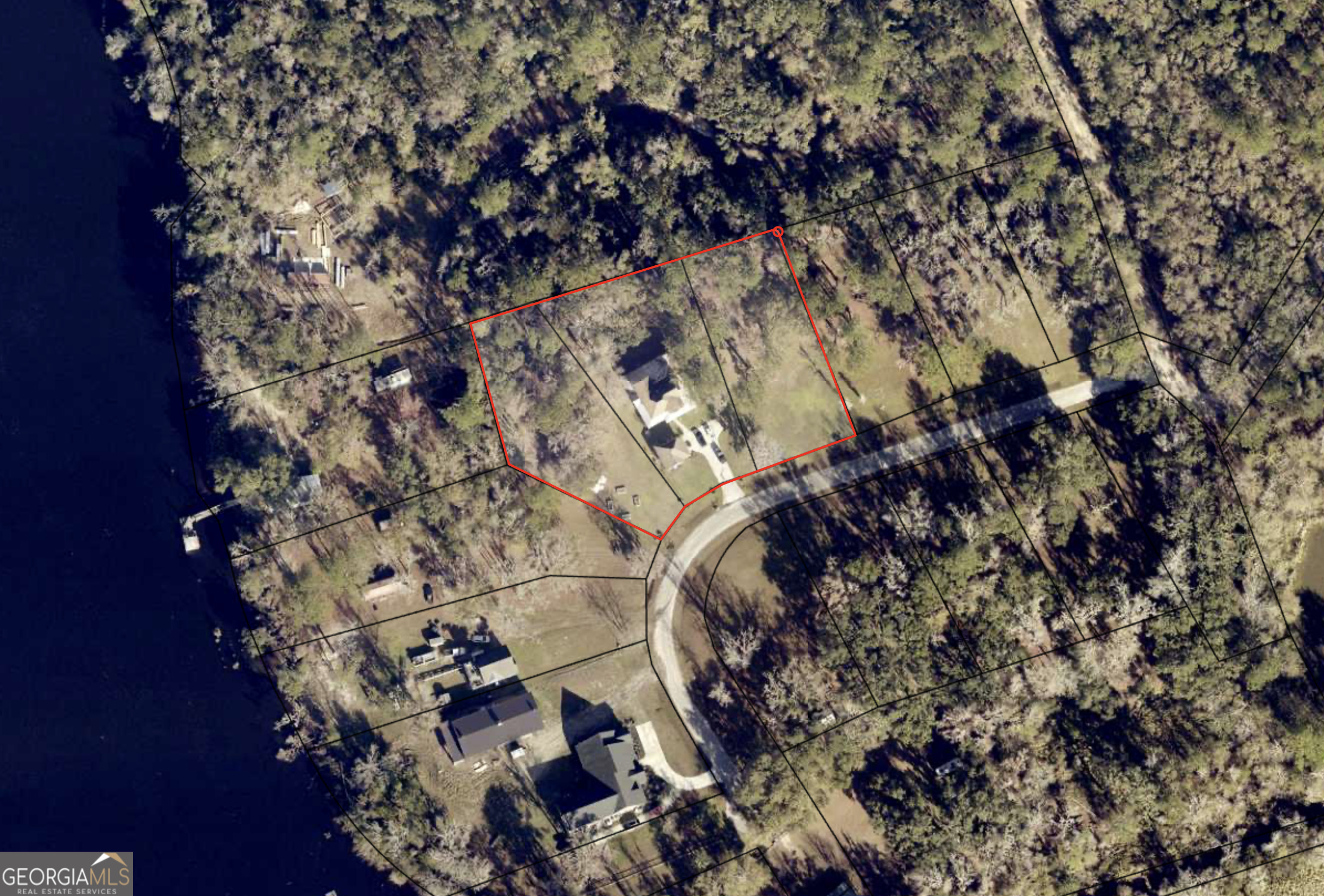 706 Hopewell Point Road White Oak, GA 31568 - Photo 85 of 85 Opportunity to own multiple adjoining parcels in Hopewell Point. This aerial overview highlights the property's impressive footprint and the privacy afforded by its wooded surroundings near the Satilla River.