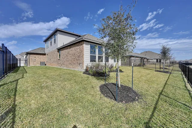 a house view with a garden space