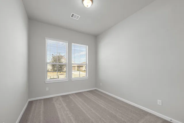 an empty room with a window