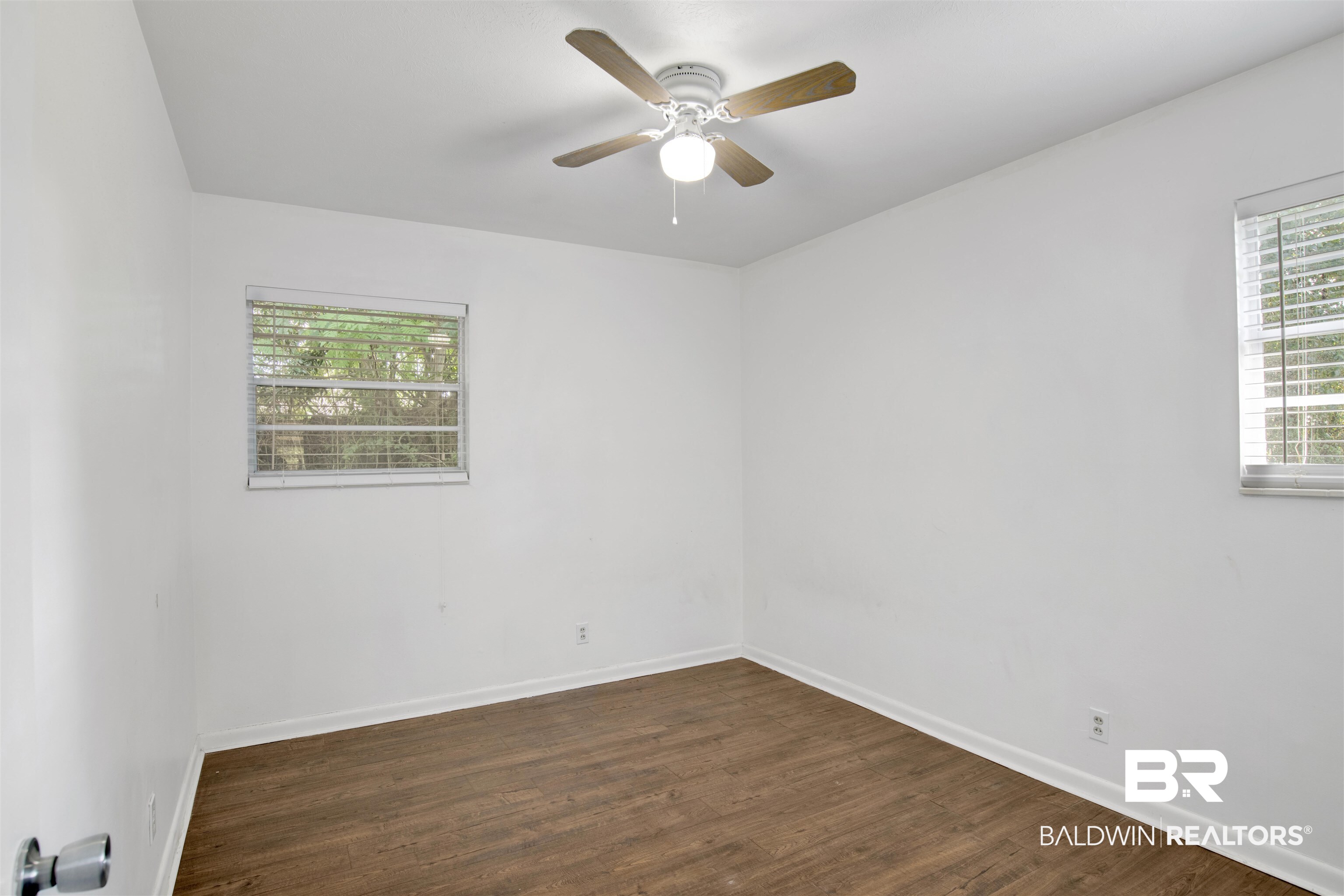 2 Lee Circle Daphne, AL 36527 - Photo 12 of 21 Empty room featuring ceiling fan and dark wood-type flooring
