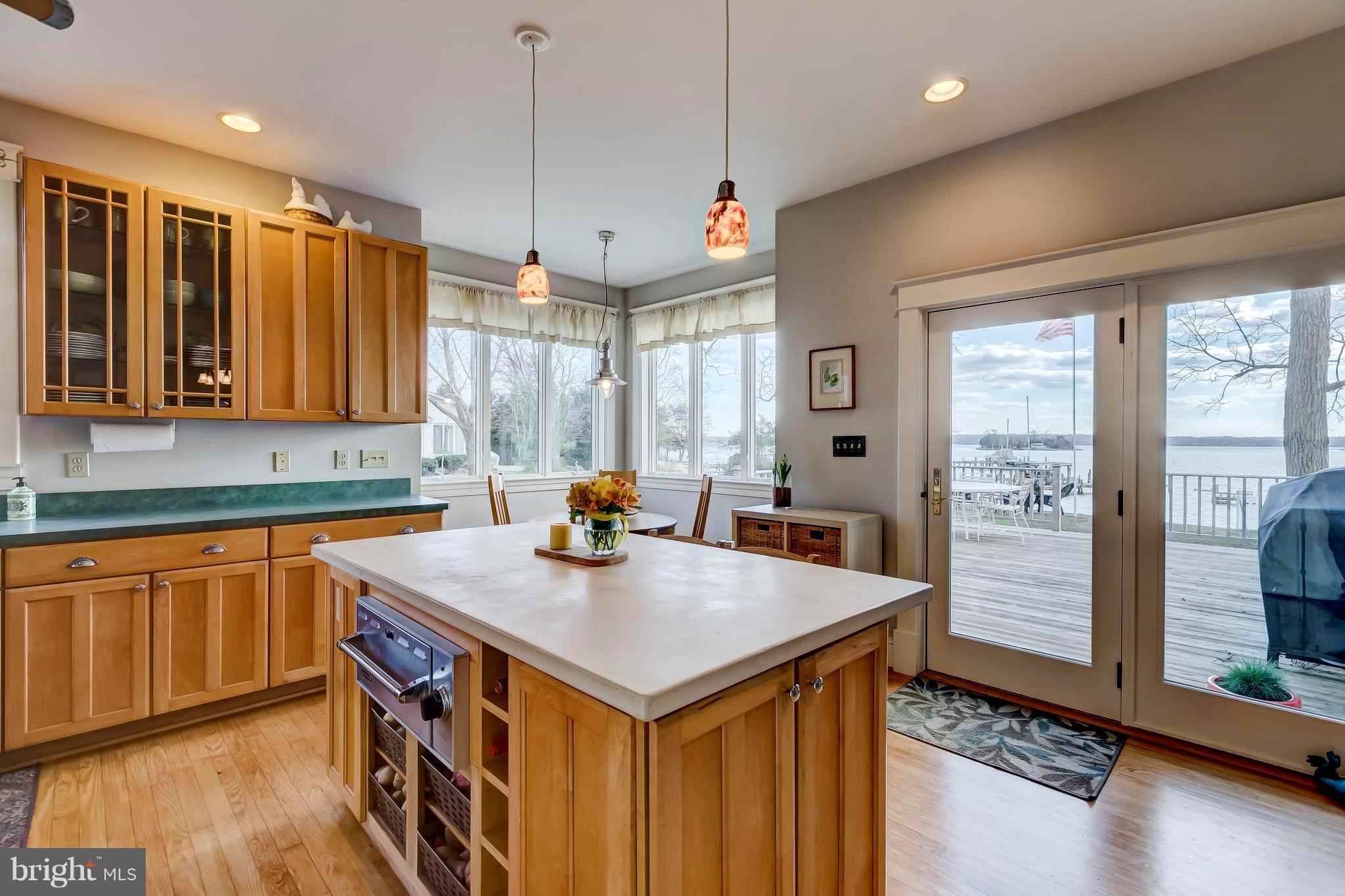 352 Hickory Point Road Pasadena, MD 21122 - Photo 3 of 28 Spacious kitchen opens to a large deck