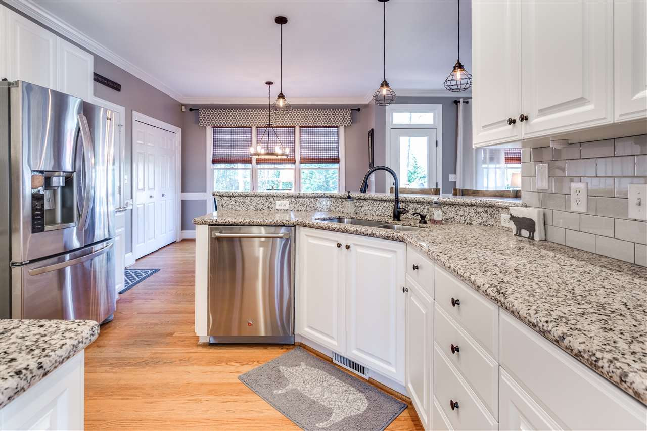 2117 Lovdal Drive Raleigh, NC 27613 - Photo 6 of 24 AMAZING KITCHEN WITH GRANITE COUNTERS & STAINLESS APPLIANCES. Kitchen