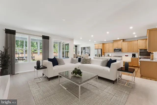 a living room with furniture or outdoor view and a large window