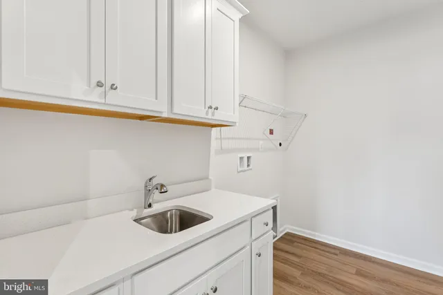 a view of utility room and sink