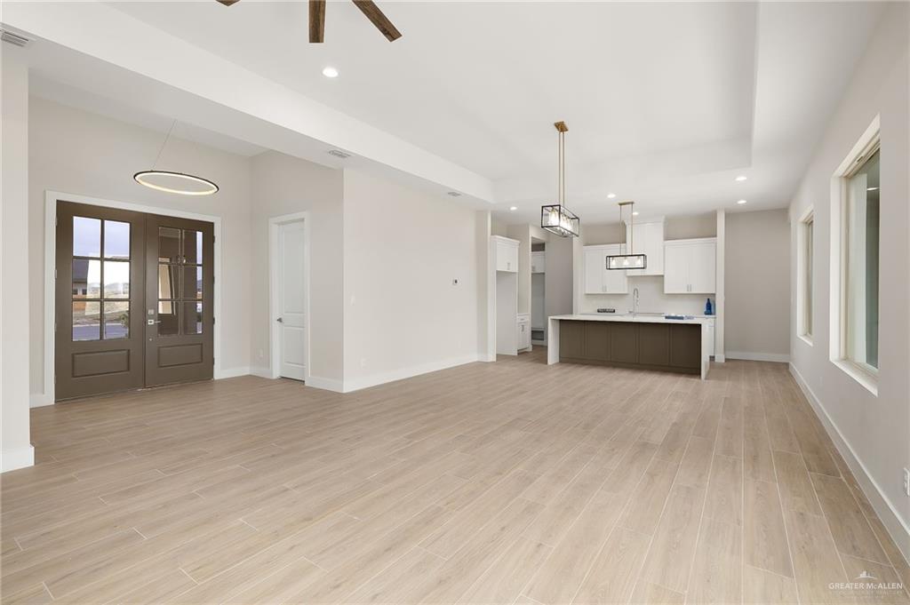 2529 Trinity Avenue McAllen, TX 78504 - Photo 2 of 25 a view of kitchen and hall with wooden floor