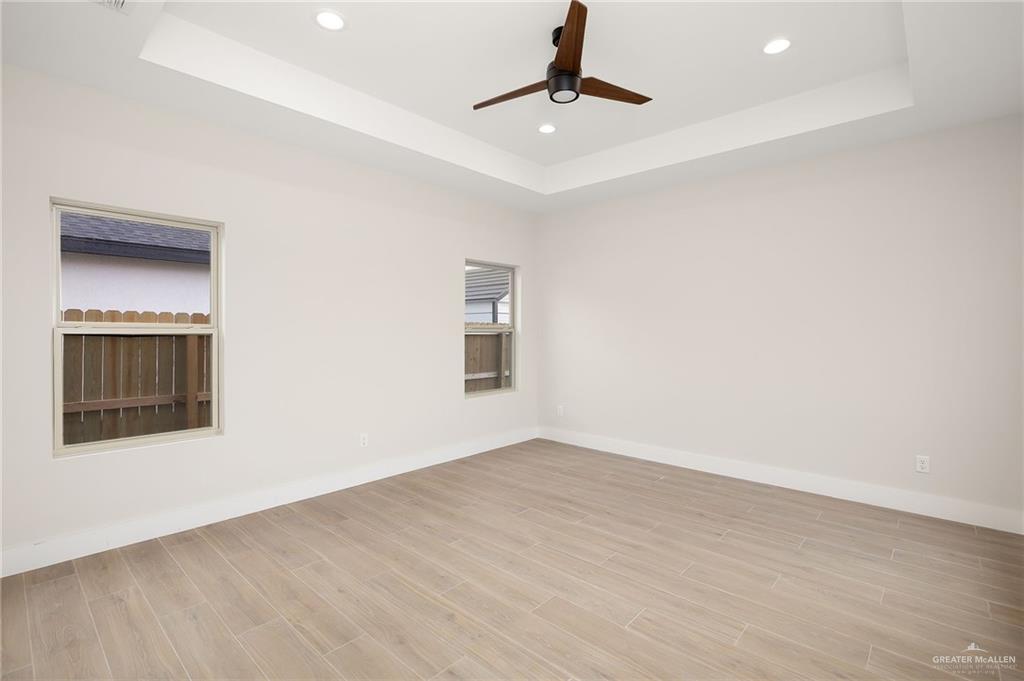 2529 Trinity Avenue McAllen, TX 78504 - Photo 9 of 25 wooden floor in an empty room