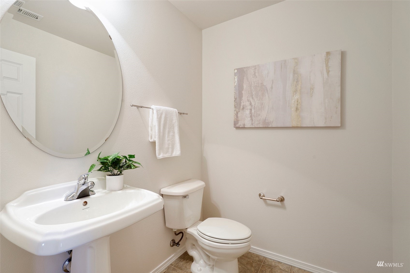 18015 168th Way Southeast Renton, WA 98058 - Photo 13 of 40 a bathroom with a sink mirror and toilet