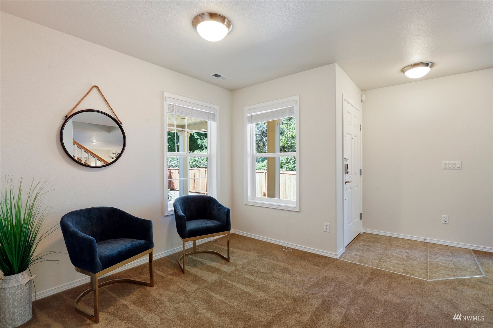 18015 168th Way Southeast Renton, WA 98058 - Photo 16 of 40 a living room with furniture and a window