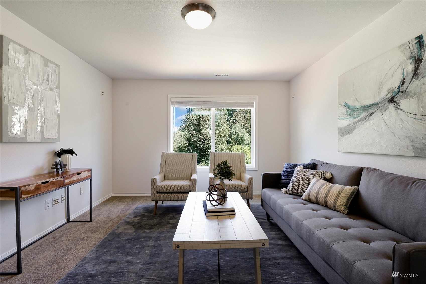 18015 168th Way Southeast Renton, WA 98058 - Photo 18 of 40 a living room with furniture and a large window