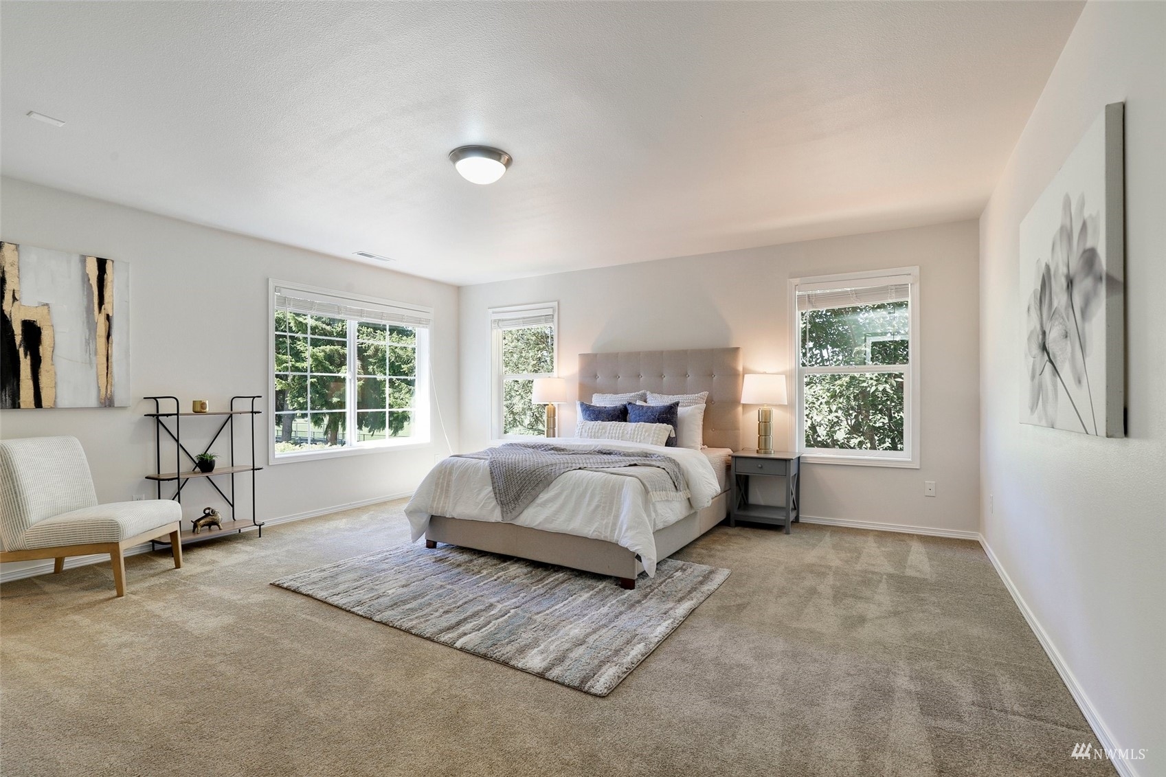 18015 168th Way Southeast Renton, WA 98058 - Photo 19 of 40 a bedroom with a bed a table and chair