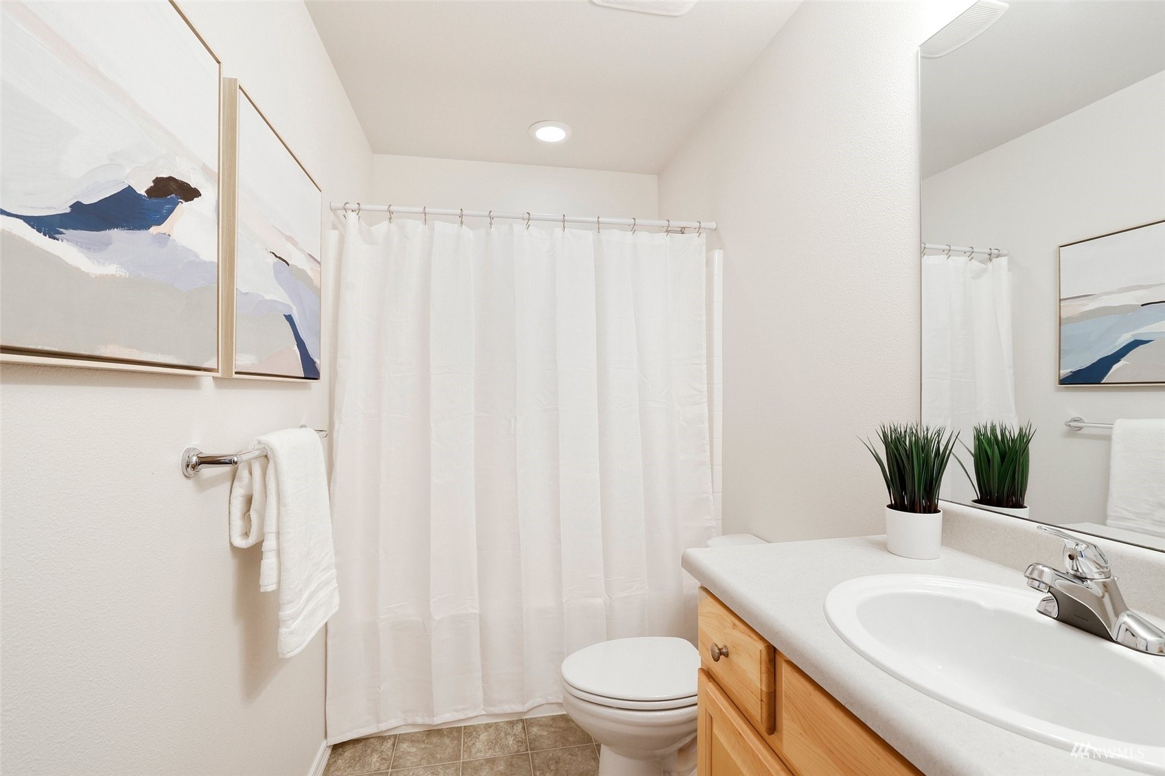 18015 168th Way Southeast Renton, WA 98058 - Photo 26 of 40 a bathroom with a sink toilet and shower