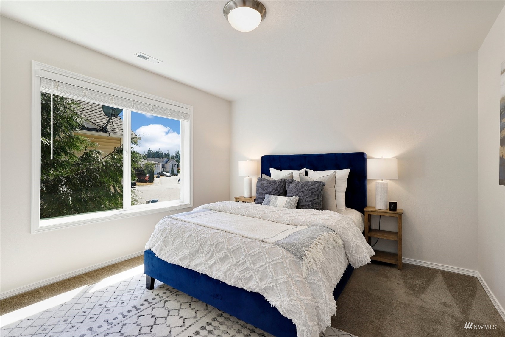 18015 168th Way Southeast Renton, WA 98058 - Photo 27 of 40 a bedroom with a bed and window