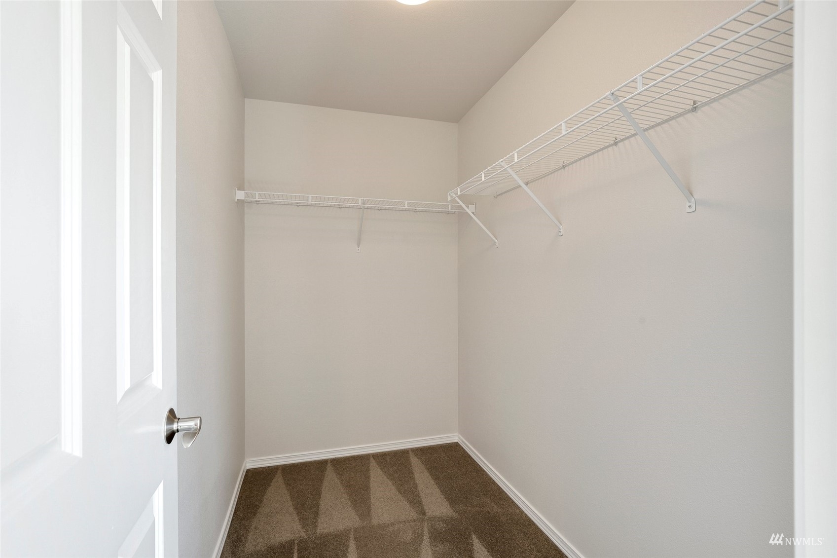 18015 168th Way Southeast Renton, WA 98058 - Photo 28 of 40 a view of small space with racks on the wall