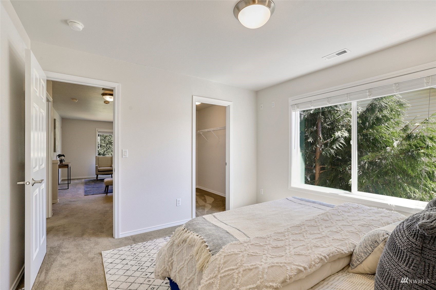 18015 168th Way Southeast Renton, WA 98058 - Photo 29 of 40 a bedroom with a bed and a large window