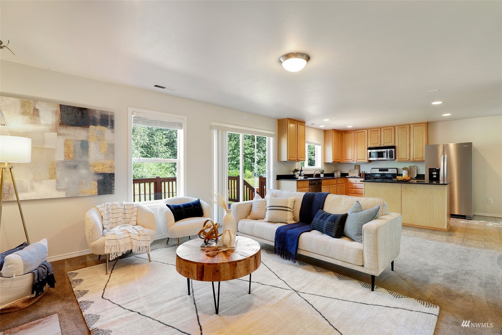18015 168th Way Southeast Renton, WA 98058 - Photo 5 of 40 a living room with furniture kitchen view and a large window