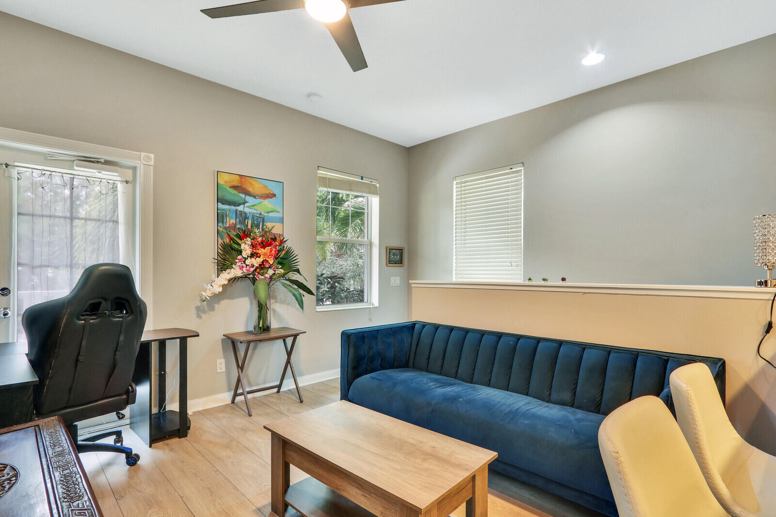 101 St Pierre Way Jupiter, FL 33458 - Photo 37 of 57 a living room with furniture a piano and a window