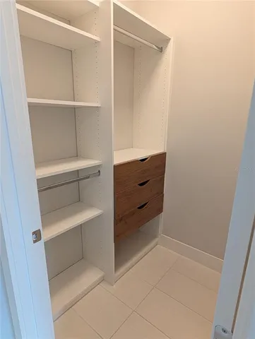 a view of an empty walk in closet