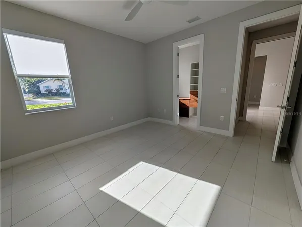 an empty room with windows