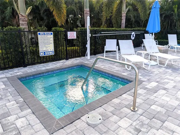 a sign that is in front of flowers