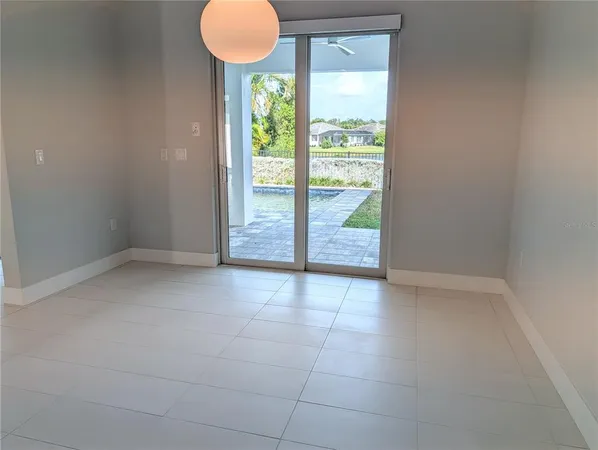 a view of an empty room and window