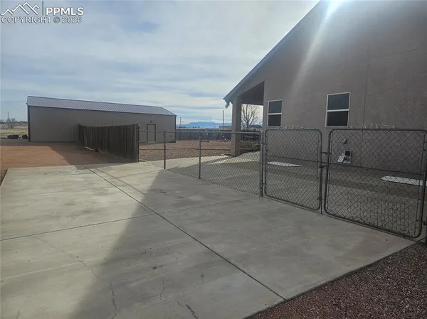 a view of an empty room with a yard