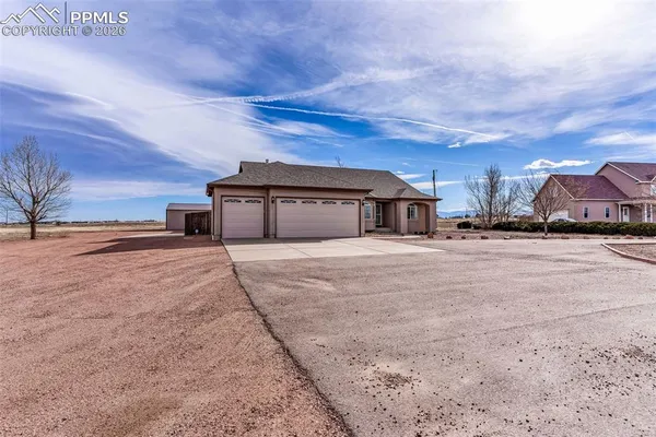 a house with yard in front of it