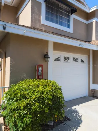 a kitchen with stainless steel appliances granite countertop a refrigerator stove and microwave
