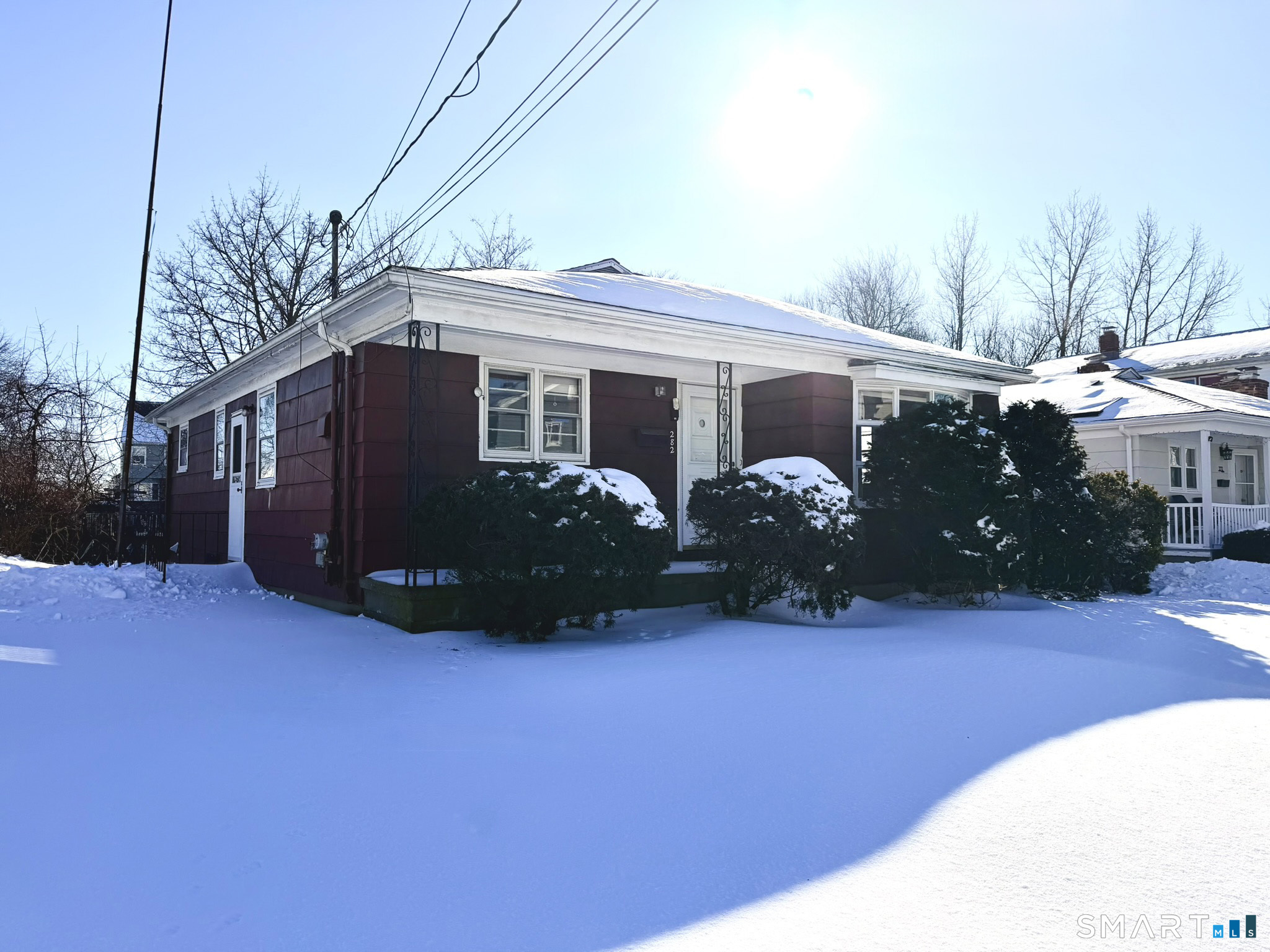 282 Horace Street Bridgeport, CT 06610 - Photo 1 of 1 a front view of a house with a yard