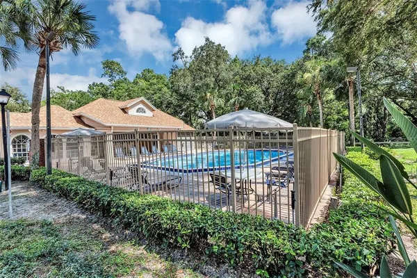 a front view of house with yard and outdoor seating